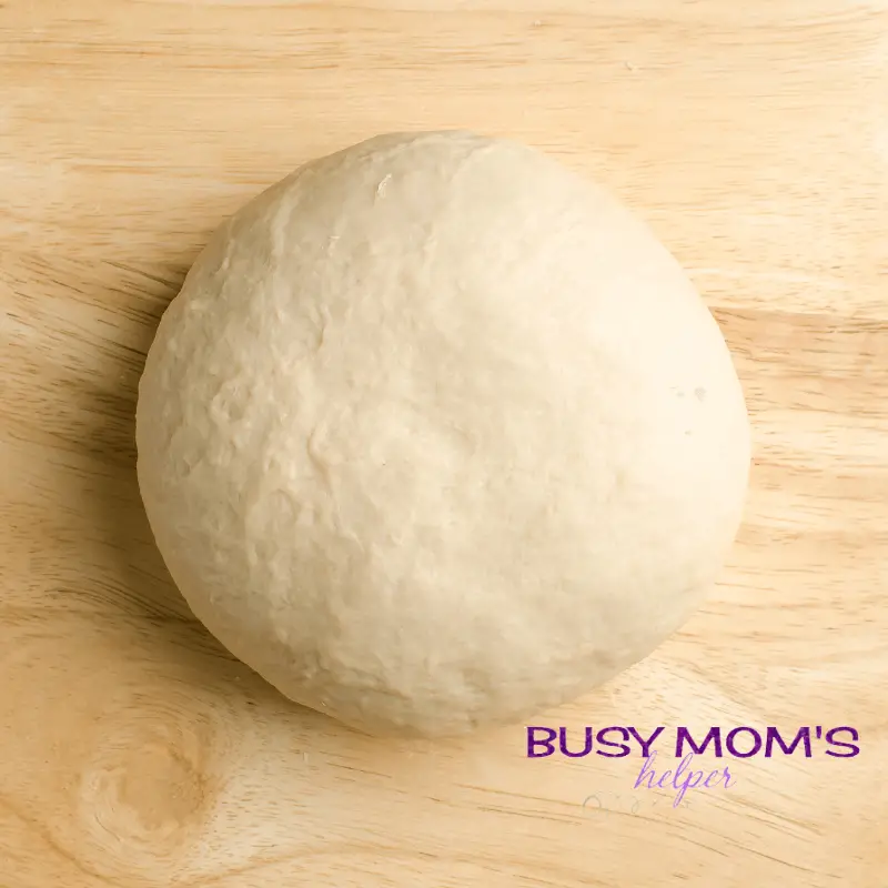 Photo of smooth white bread dough. 