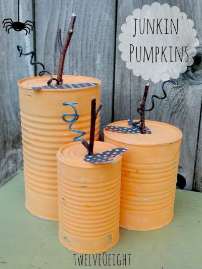 painted tin can pumpkins